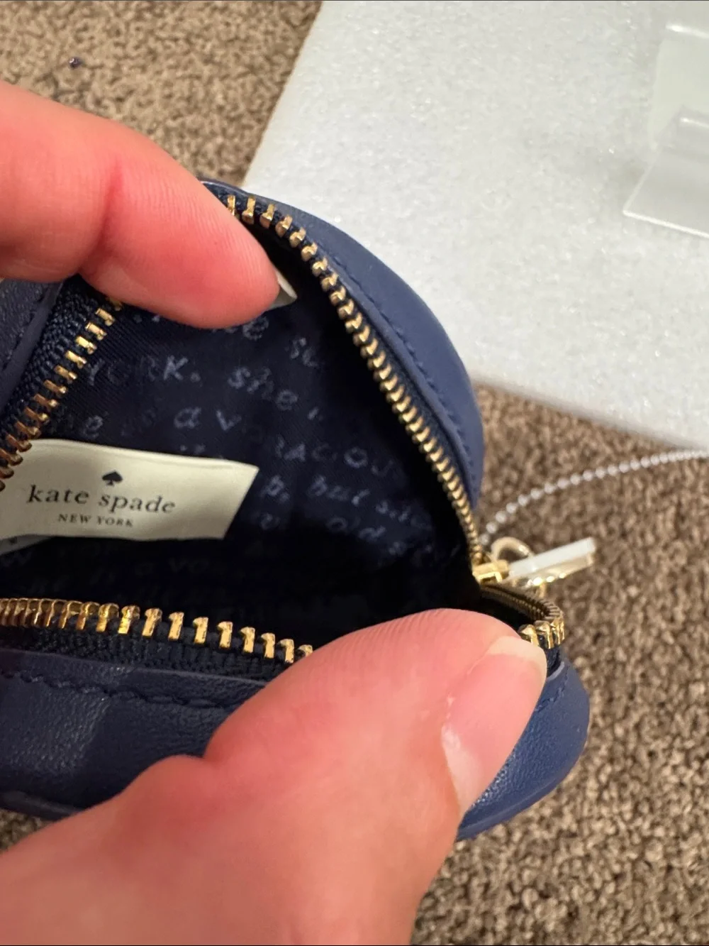 Kate spade everything starts from a dot storybook lining coin purse